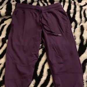 Purple joggers.
